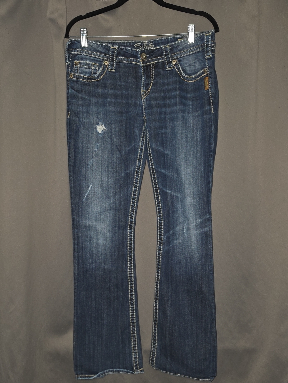 Silver Jeans Dark Wash Bootcut Jeans with Subtle Distress
